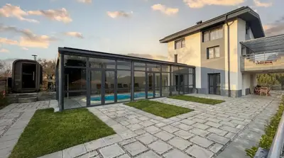 a house with a swimming pool in the backyard at Къща за гости Алино Хаус in Alino