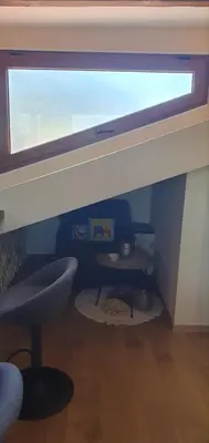 a room with a window and a sink and a table at Къща за гости ОЗИ 3 in Ovchartsi