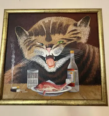 a painting of a cat with a fish on a plate at Кольовата къща Тетевен in Teteven