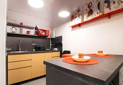 a kitchen with a counter with two dishes on it at Near NDK - Washer&Dryer - Fast Wi-Fi - Kitchenette in Sofia