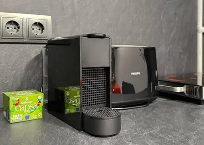 a computer monitor sitting on top of a counter at Near NDK - Washer&Dryer - Fast Wi-Fi - Kitchenette in Sofia