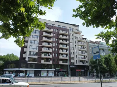 a large apartment building on the side of a street at One Bedroom Apartment 4 - Restaurant Stadium Plovdiv in Plovdiv