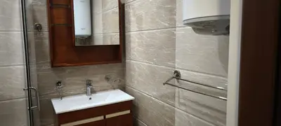 a bathroom with a sink and a mirror at One Bedroom Apartment 2 - Restaurant Stadium Plovdiv in Plovdiv
