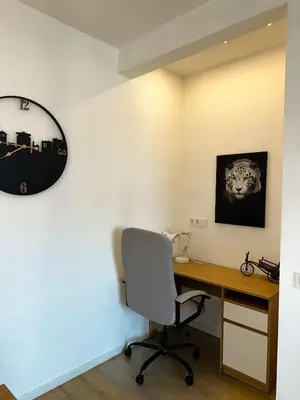 an office with a desk and a chair at Serdika Central Stay - 2BD next to Serdika Metro Station in Sofia