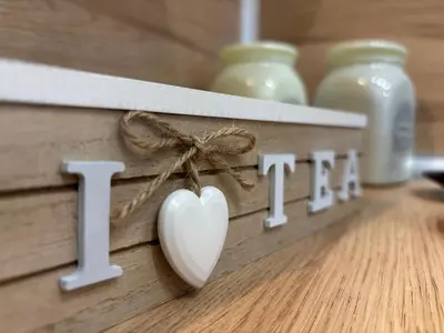 a heart hanging on a wall with the words i love at Luxury & Comfort near the University in Blagoevgrad