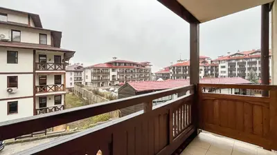 a balcony with a view of some buildings at Bansko Peak Apartments 106 in Bansko