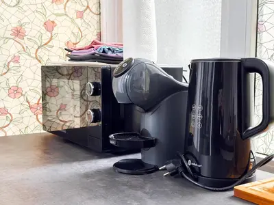 a coffee maker sitting on top of a counter at Cozy Central 1BD Apartment in Sofia