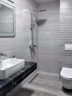 a bathroom with a sink and a toilet at Vital Hotel in Sofia