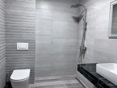 a bathroom with a toilet and a sink at Vital Hotel in Sofia