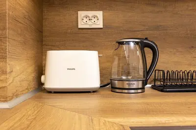 a blender and a toaster sitting on a counter at Gorgeous central Yanevi 2 BR & parking in Plovdiv