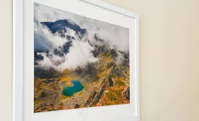 a picture of a mountain with clouds and a lake at 2BR Apt - Parking - Central - 1st floor - ACs in Sofia
