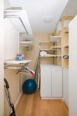 a room with shelves and a desk and a ball at Sunny 1BR with Balcony in Sofia