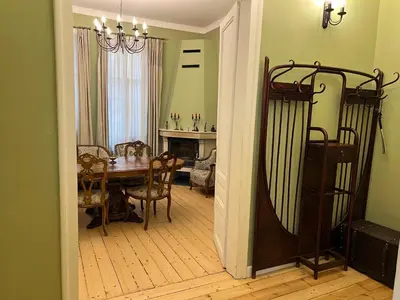 a dining room with a dining table and a dining roomiasm at Belview Apartment with Panoramic Old Town View in Plovdiv
