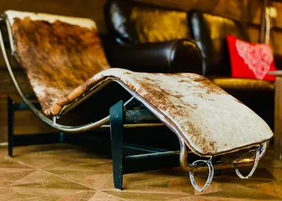 an old couch with a dirty seat in a living room at Studio with pool, SPA near the Ski Lift in Bansko