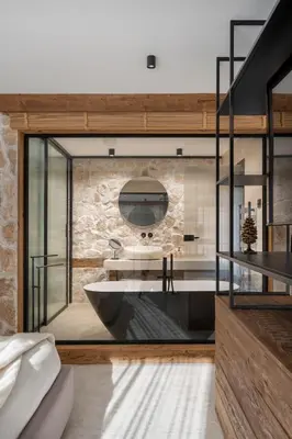 a bathroom with a large tub in a room at Flora Boutique Hotel in Borovets