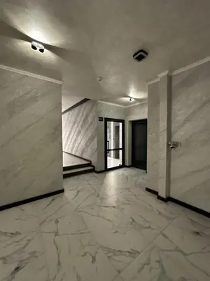 an empty room with marble floors and walls at Diamond Casa with Free Private Parking in Plovdiv