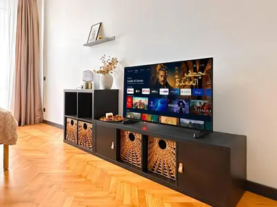 a living room with a large flat screen tv at Duplex Retreat 2 Studios Balconies, Wi-Fi in Sofia