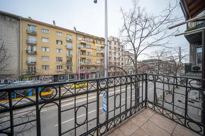 a view of a city street from a balcony at VEGA Apartments - Metro in Sofia