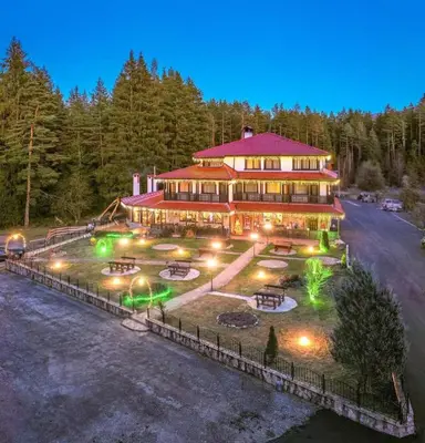 an aerial view of a large building with lights at Свети Георги хотел и ресторант in Govedartsi