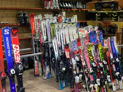 a bunch of skis are lined up in a store at The View Bansko in Bansko