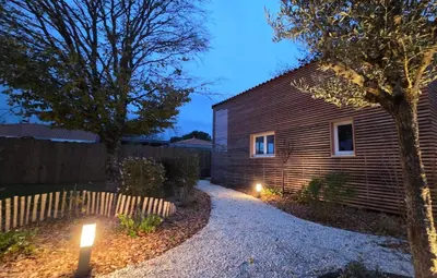 a house with two lights on the side of it at Cottage for 4 people 30 in Sofia