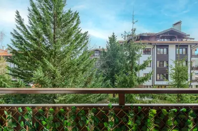 a view of a building from a balcony at Your studio at Winslow Infinity in Bansko
