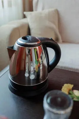 a tea kettle is sitting on a table at Trafi Em in Sofia