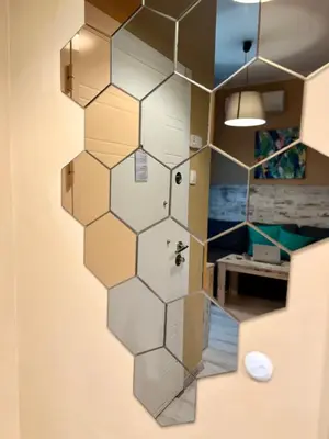 a bathroom with a hexagon shaped wall at Flower home 1 in Sofia