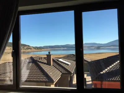 a view of a beach from a window at La Casa Hotel in Tsigov Chark