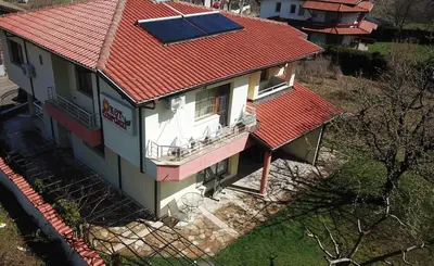 an overhead view of a house with a red roof at Kot Garden Guest House in Sapareva Banya