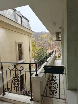 a balcony with a view of a building at Noviz Hotel in Plovdiv