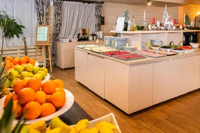 a kitchen with fruits and vegetables on display at Green Life Bansko in Bansko