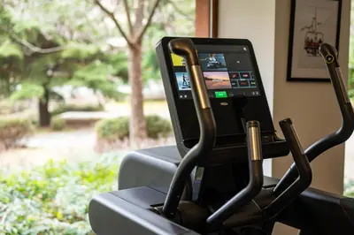 a close up of a treadmill with a screen on it at Four Points by Sheraton Bansko in Bansko