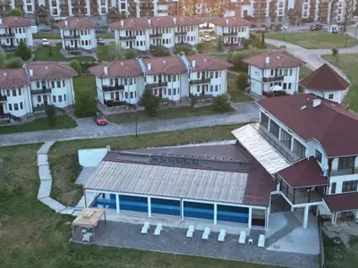 an aerial view of a residential neighborhood with houses at Pinerose Resort in Bansko