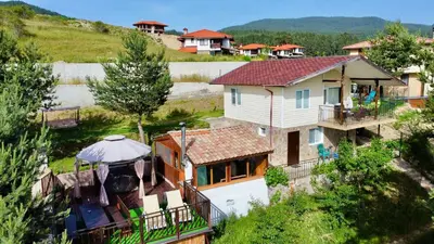 an aerial view of a house with an umbrella at Villa Eti in Dospat
