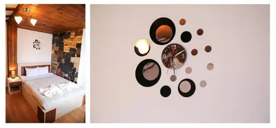 a bedroom with a clock on the wall at House of Time in Ognyanovo