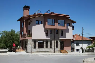 a building on the side of a street at Sveti Nikola Family Hotel Sapareva Banya in Sapareva Banya