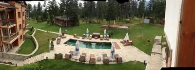an aerial view of a backyard with a swimming pool at Entire Private Apartment in Pirin Golf & Country Club in Bansko
