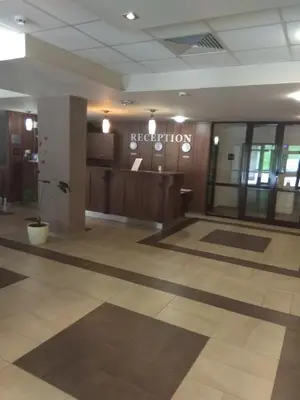 a lobby of a hospital with a reception desk at Studio in Borovets Gardens Complex in Borovets