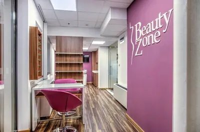 an office with a purple wall with a beauty tone sign at Holiday Inn Plovdiv by IHG in Plovdiv