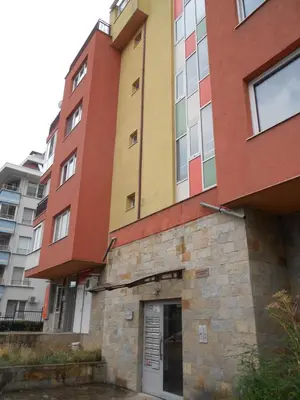 a building with a door on the side of it at Апартамент Мур in Sofia