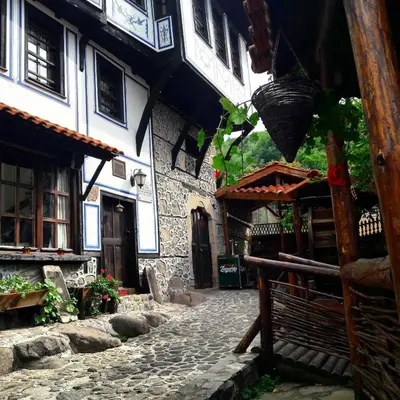 a stone street in front of a building at Popsokol House in Bratsigovo