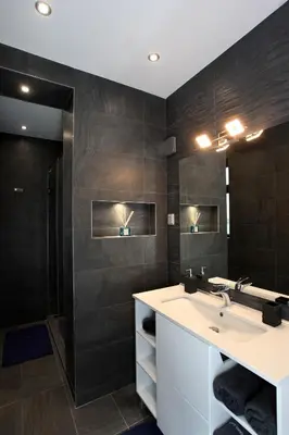 a bathroom with a sink and a mirror at Silver Springs in Sofia