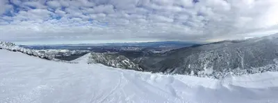 a view of a snow covered mountain with snow at Chalet Mechka in Borovets