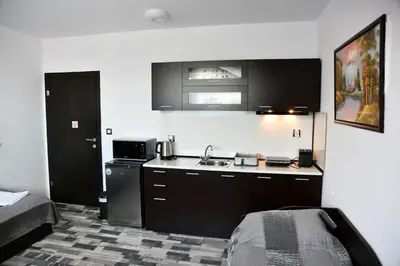 a kitchen with a sink and a counter top at Ski Apartment Boyika Iglika 2 in Borovets