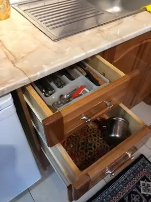 a kitchen counter with a drawer with tools on it at Manastira 2 apt Emo Pamporovo in Pamporovo