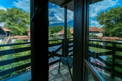 a view from the window of a house at Kadiyata Guest House in Bansko