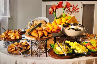a table topped with lots of different types of food at Zornitza Family Estate Relais & Chateaux in Melnik