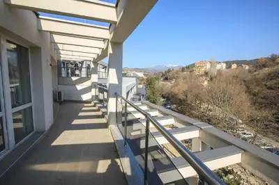 a balcony of a building with a view at Sundance Apartments in Sandanski