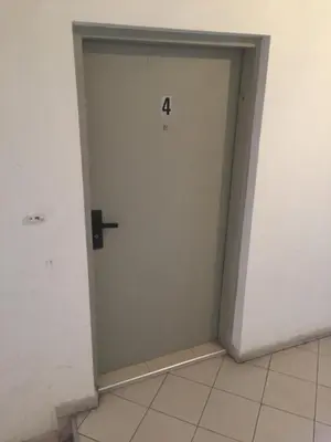 a door with the number four on it in a room at Pirotska Apartment GN / FREE GARAGE in Sofia